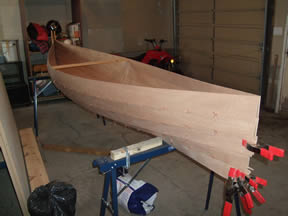 Somehow 5 planks turn into a canoe!