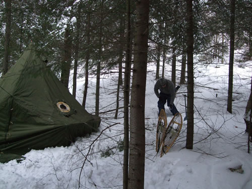 Markus adjusting a tent line.