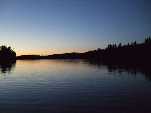 A clear sky at sunset.