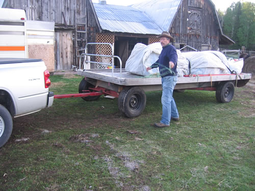 Our Teamster, Andrew, loading up the wagon.